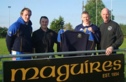 Caolac Monaghan of Maguire's Bar & Lounge presenting Tops